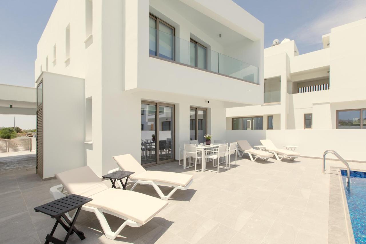 Palm Tree Villas Livadhia Exterior photo